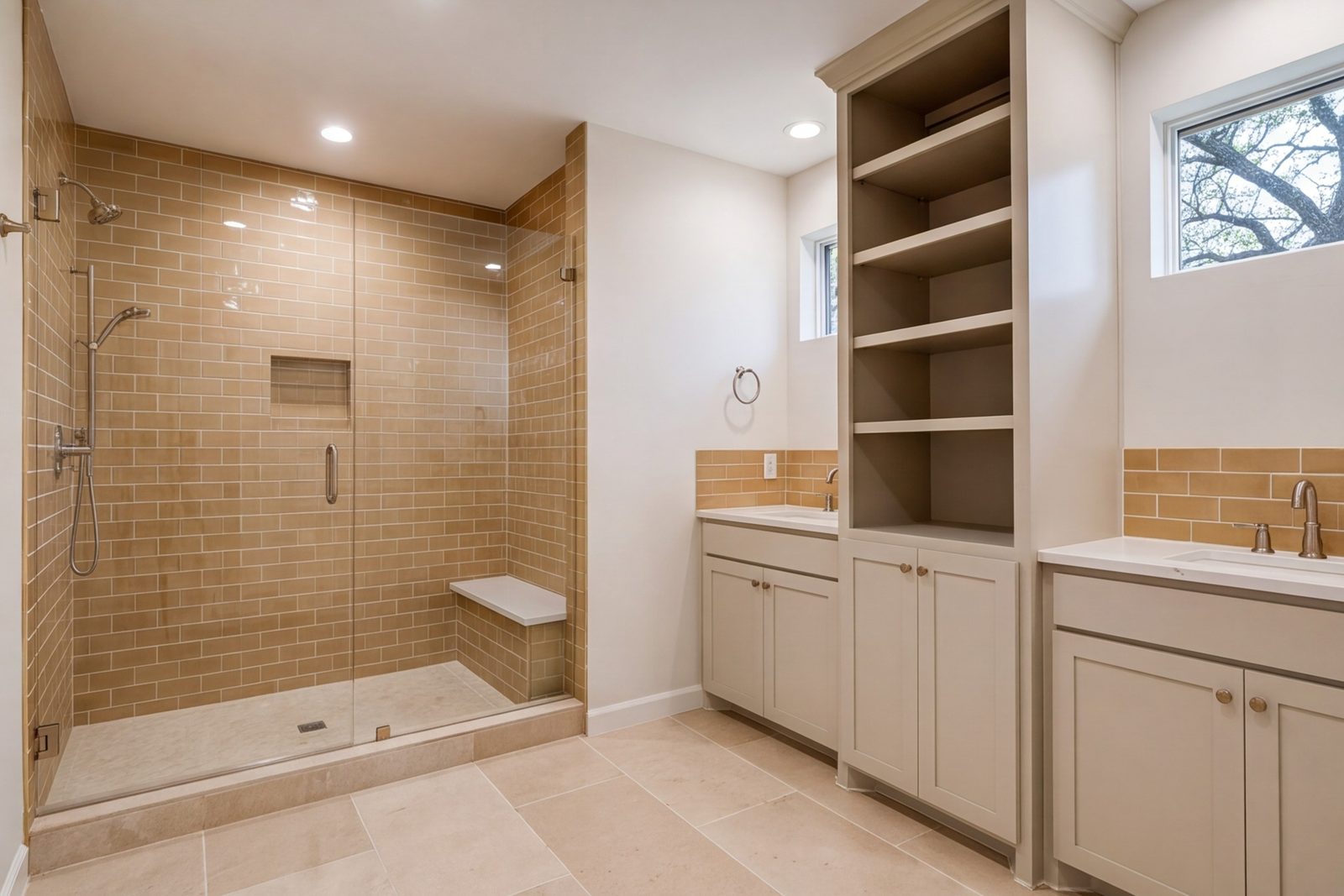 Stockyards hall bathroom with wide shower, tall storage and warm tile
